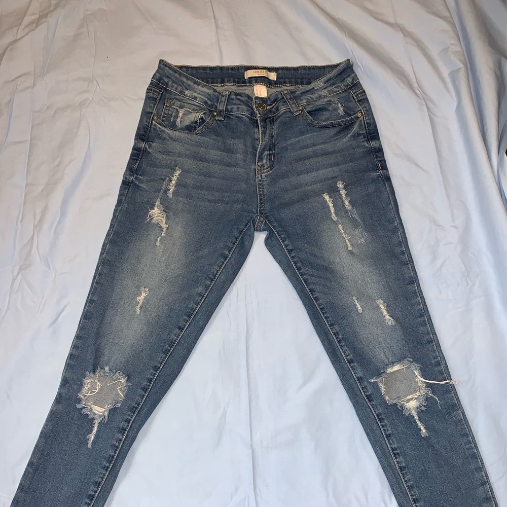 Blue ripped jeans. Forever 21